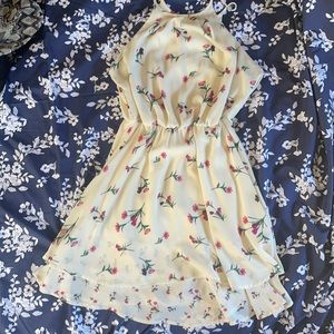 Cream colored dress with flowers. Size Small